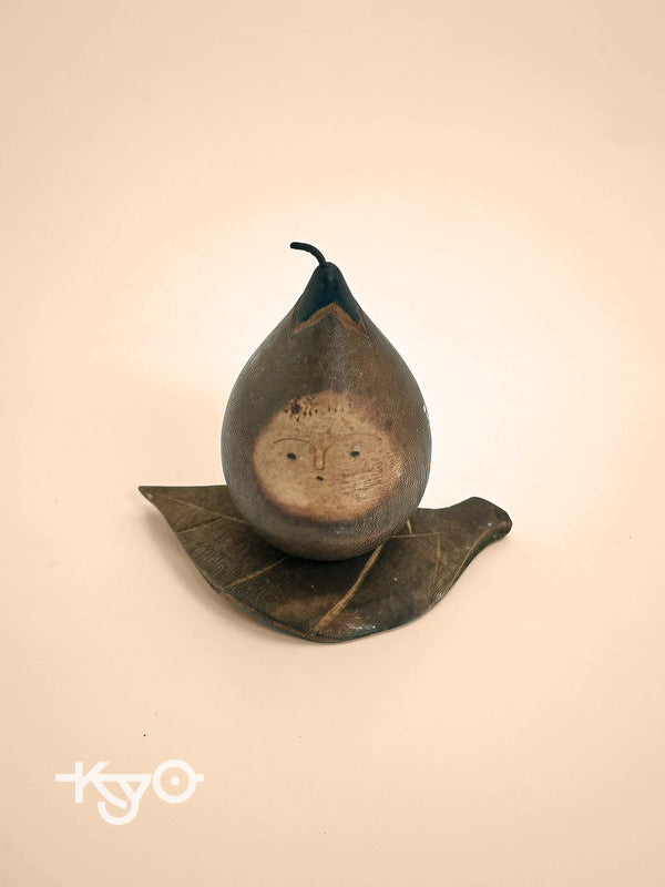 K05035 - Vintage aubergine omiyage doll from Nasua