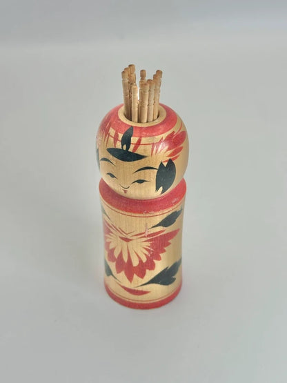 K10077 - Porte-cure-dents Naruko Kokeshi