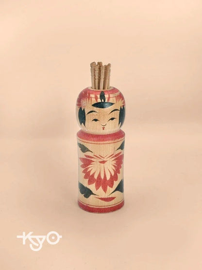 K10077 - Porte-cure-dents Naruko Kokeshi