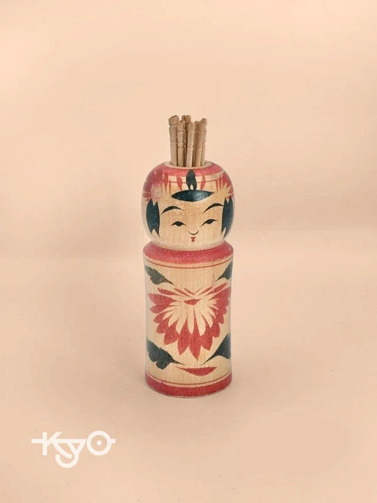 K10077 - Porte-cure-dents Naruko Kokeshi