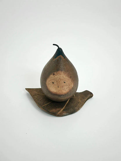 K05035 - Vintage aubergine omiyage doll from Nasua