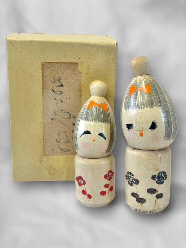 One pair of Japanese kokeshi by Seiju