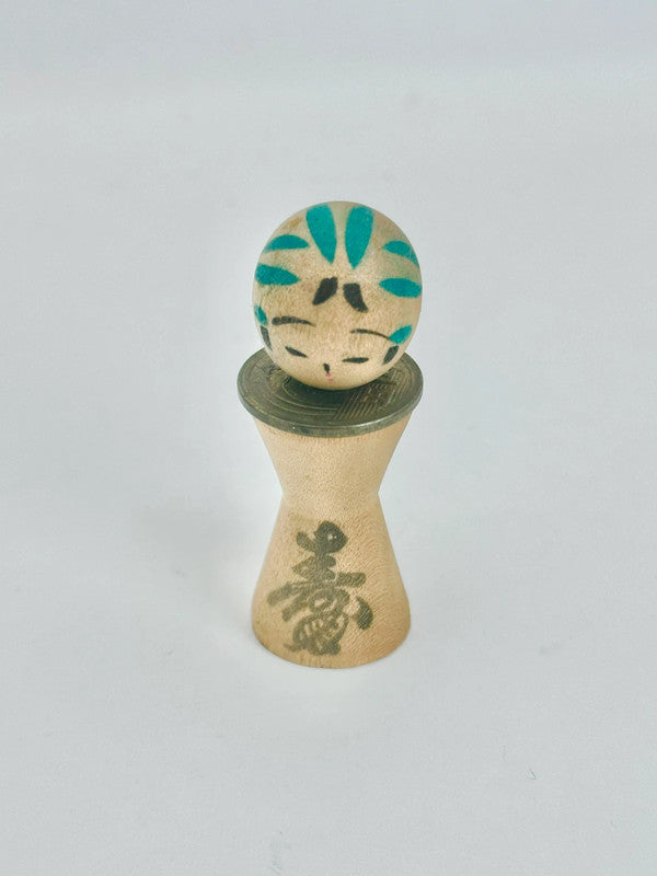 K05026 - RARE Miniature Kokeshi with 5 Yen Coin