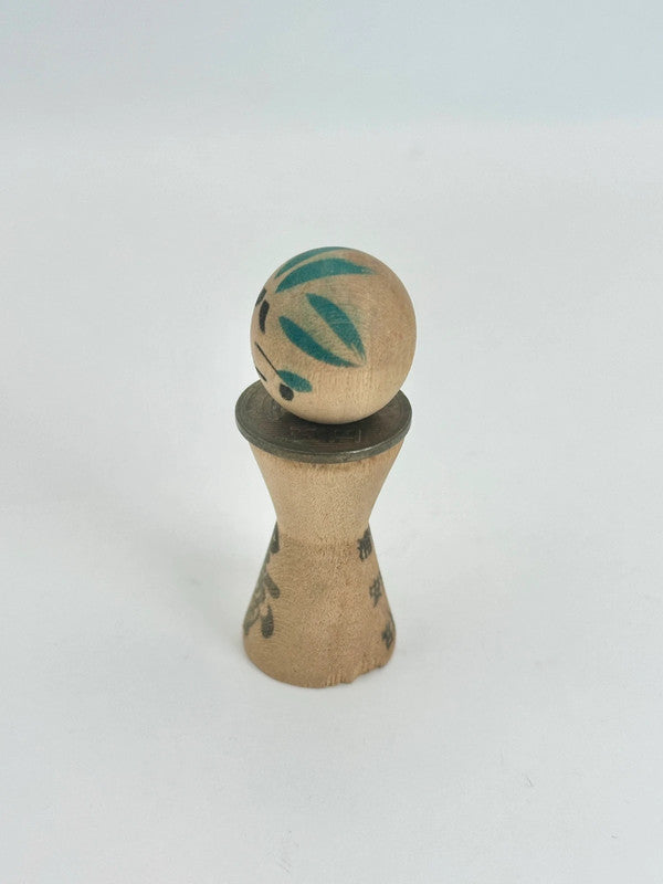 K05026 - RARE Miniature Kokeshi with 5 Yen Coin