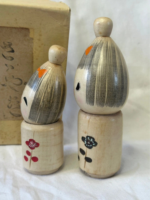 One pair of Japanese kokeshi by Seiju