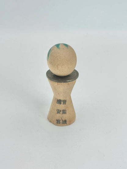 K05026 - RARE Miniature Kokeshi with 5 Yen Coin
