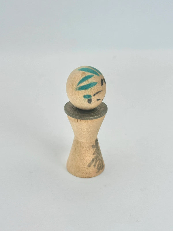 K05026 - RARE Miniature Kokeshi with 5 Yen Coin