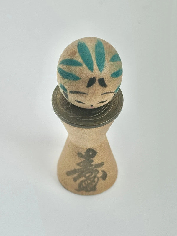 K05026 - RARE Miniature Kokeshi with 5 Yen Coin