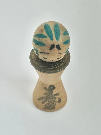 K05026 - RARE Miniature Kokeshi with 5 Yen Coin