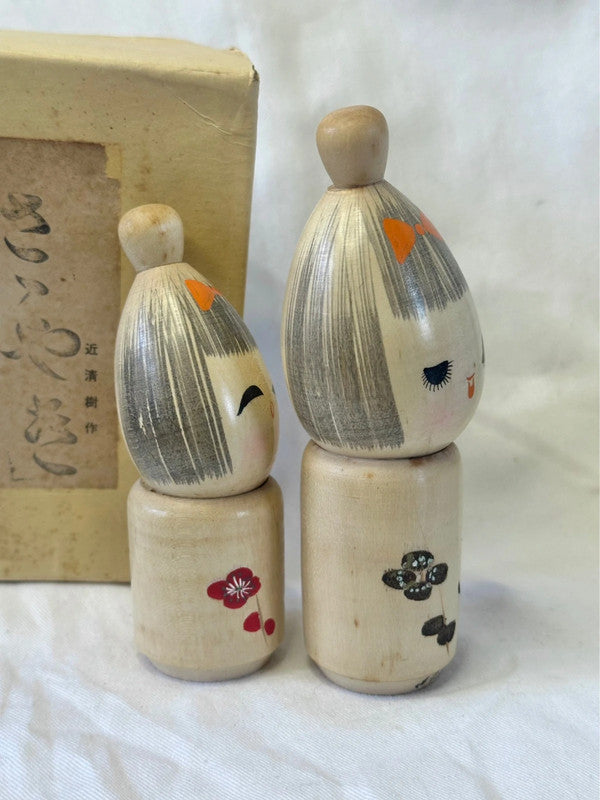 One pair of Japanese kokeshi by Seiju