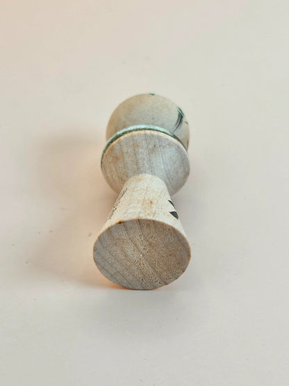 K05040 - Miniature Kokeshi with 5 Yen Coin