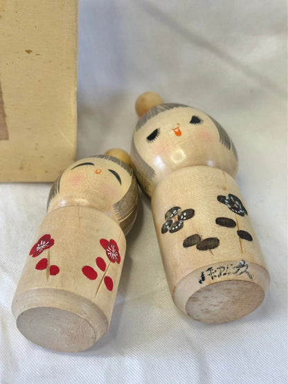 One pair of Japanese kokeshi by Seiju