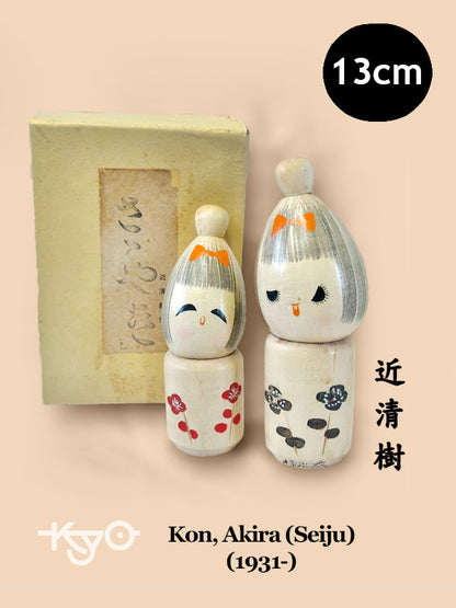 One pair of Japanese kokeshi by Seiju