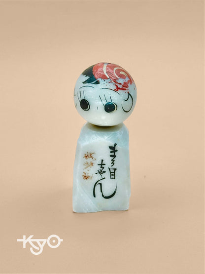 K05006 - Omiyage kokeshi doll in stone
