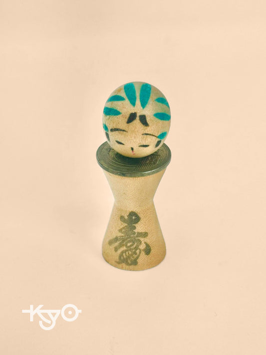 K05026 - RARE Miniature Kokeshi with 5 Yen Coin